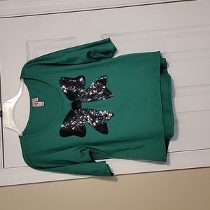 Dolled Up by FANG holiday shirt.  Green with black sequined bow.  Size xl